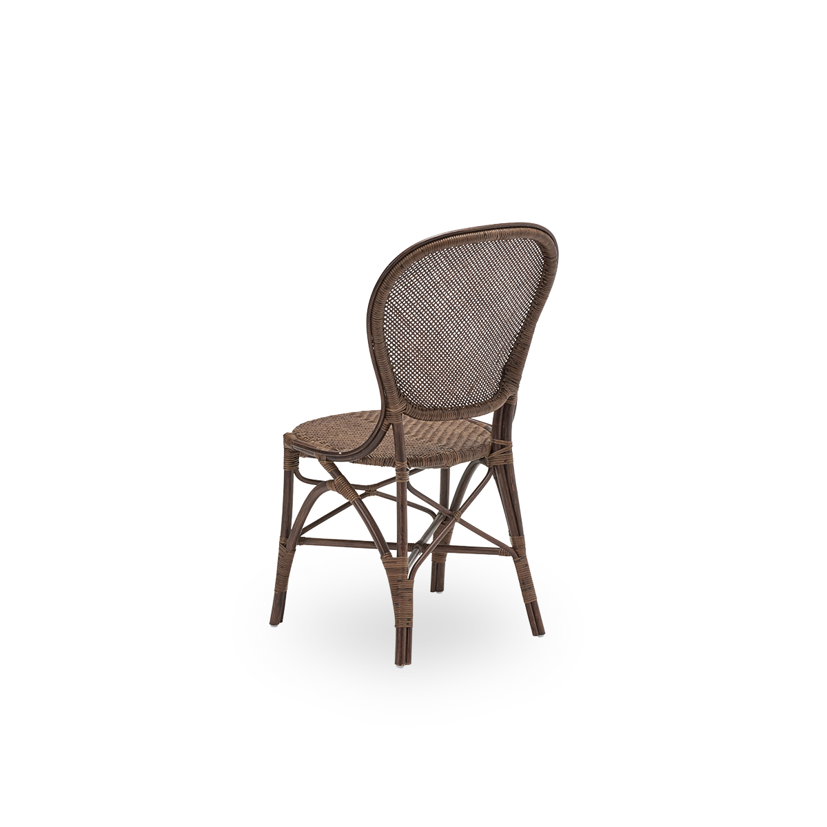 Back side view of the Rossini dining chair, in brown rattan. Designed in 1993 by Knud Andreasen of Sika-Design together with Japanese designer Yamakawa, it is the brand's signature chair. Handcrafted from high-quality Indonesian rattan.