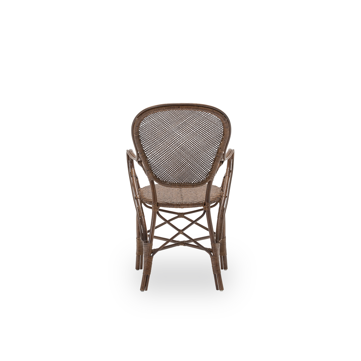 Plain back view of the Rossini dining armchair, in brown rattan. Designed in 1993 by Knud Andreasen of Sika-Design together with Japanese designer Yamakawa, it is the brand's signature chair. Handcrafted from high-quality Indonesian rattan.
