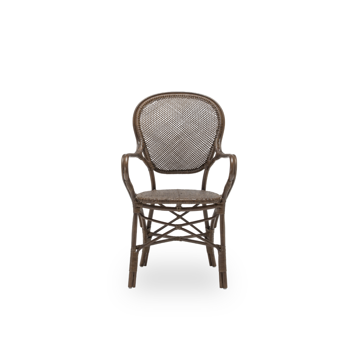 Front view of the Rossini dining armchair, in brown rattan. Designed in 1993 by Knud Andreasen of Sika-Design together with Japanese designer Yamakawa, it is the brand's signature chair. Handcrafted from high-quality Indonesian rattan.