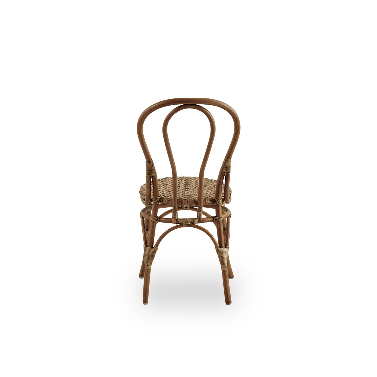 Plain back view of Lulu dining chair in Antique brown color, handcrafted from high-quality Indonesian rattan. Lightweight, elegant design with round simple backrest.