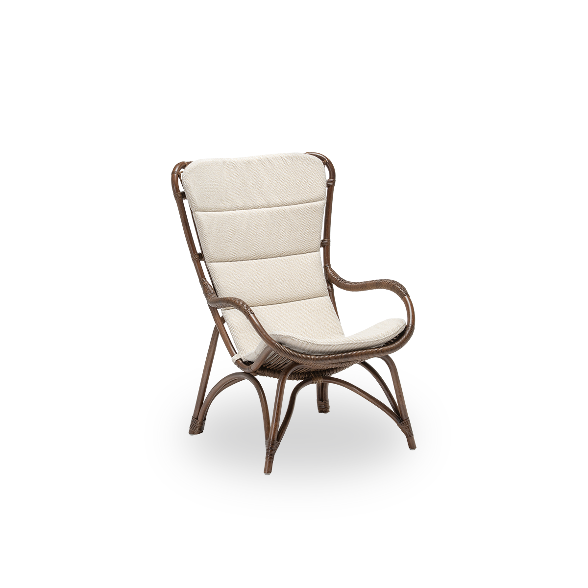 Side view of the Monet lounge chair with seat cushion, in brown rattan. An aesthetic and comfortable Danish design, with detailed windings and a generous seat. Handcrafted from high-quality Indonesian rattan.