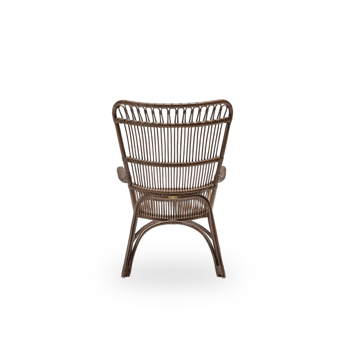 Plain back view of the Monet lounge chair, in brown rattan. An aesthetic and comfortable Danish design, with detailed windings and a generous seat. Handcrafted from high-quality Indonesian rattan.