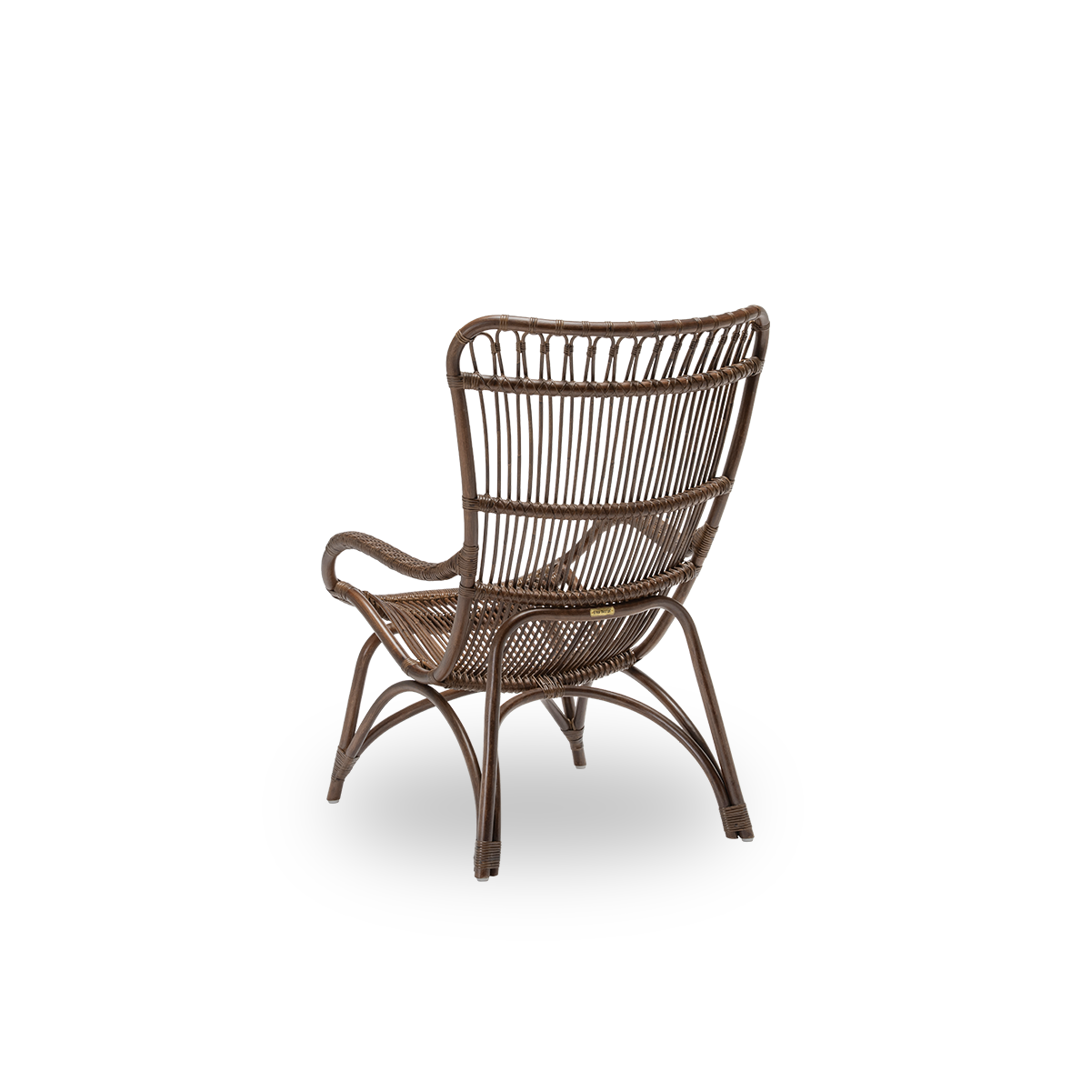 Back side view of the Monet lounge chair, in brown rattan. An aesthetic and comfortable Danish design, with detailed windings and a generous seat. Handcrafted from high-quality Indonesian rattan.