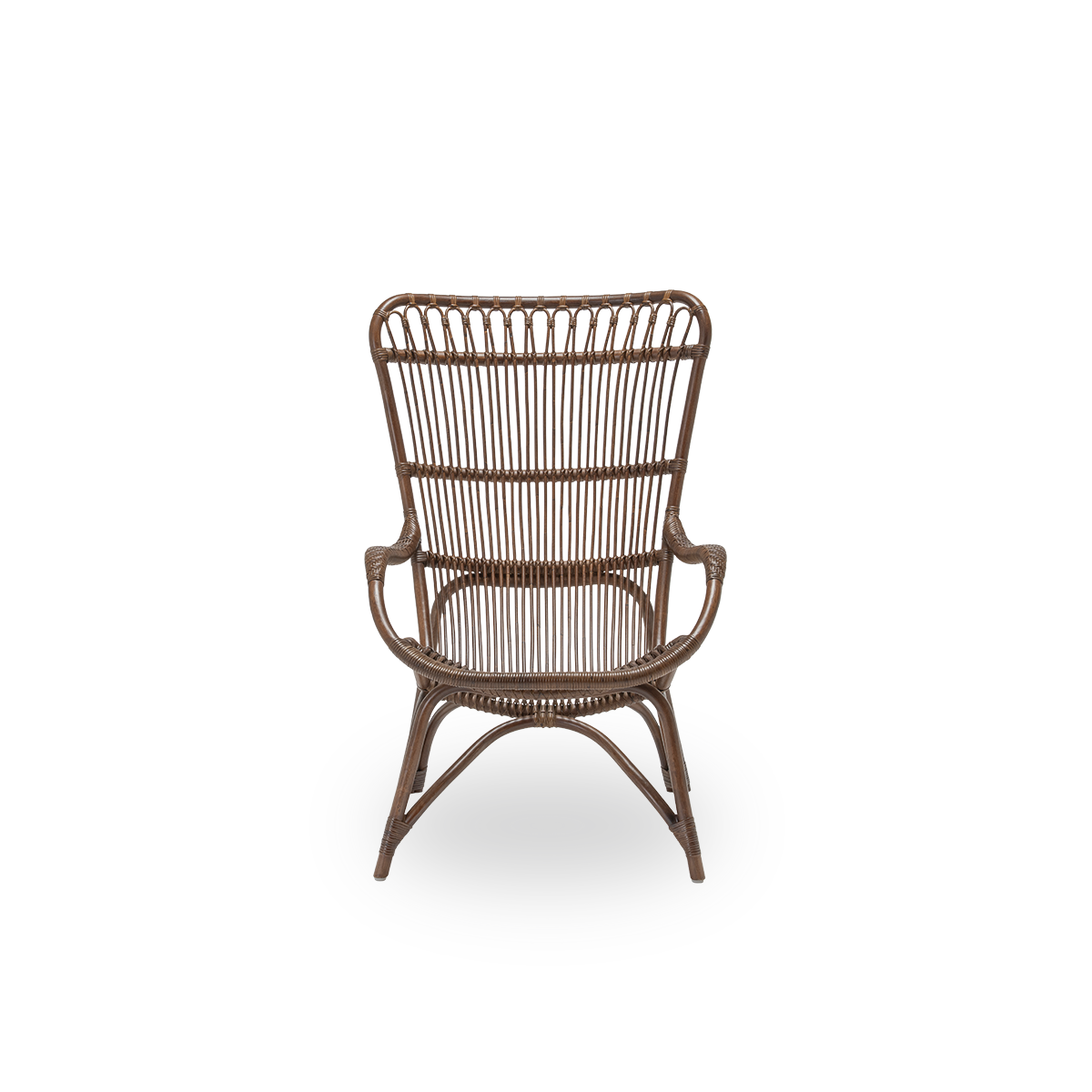Front view of the Monet lounge chair, in brown rattan. An aesthetic and comfortable Danish design, with detailed windings and a generous seat. Handcrafted from high-quality Indonesian rattan.