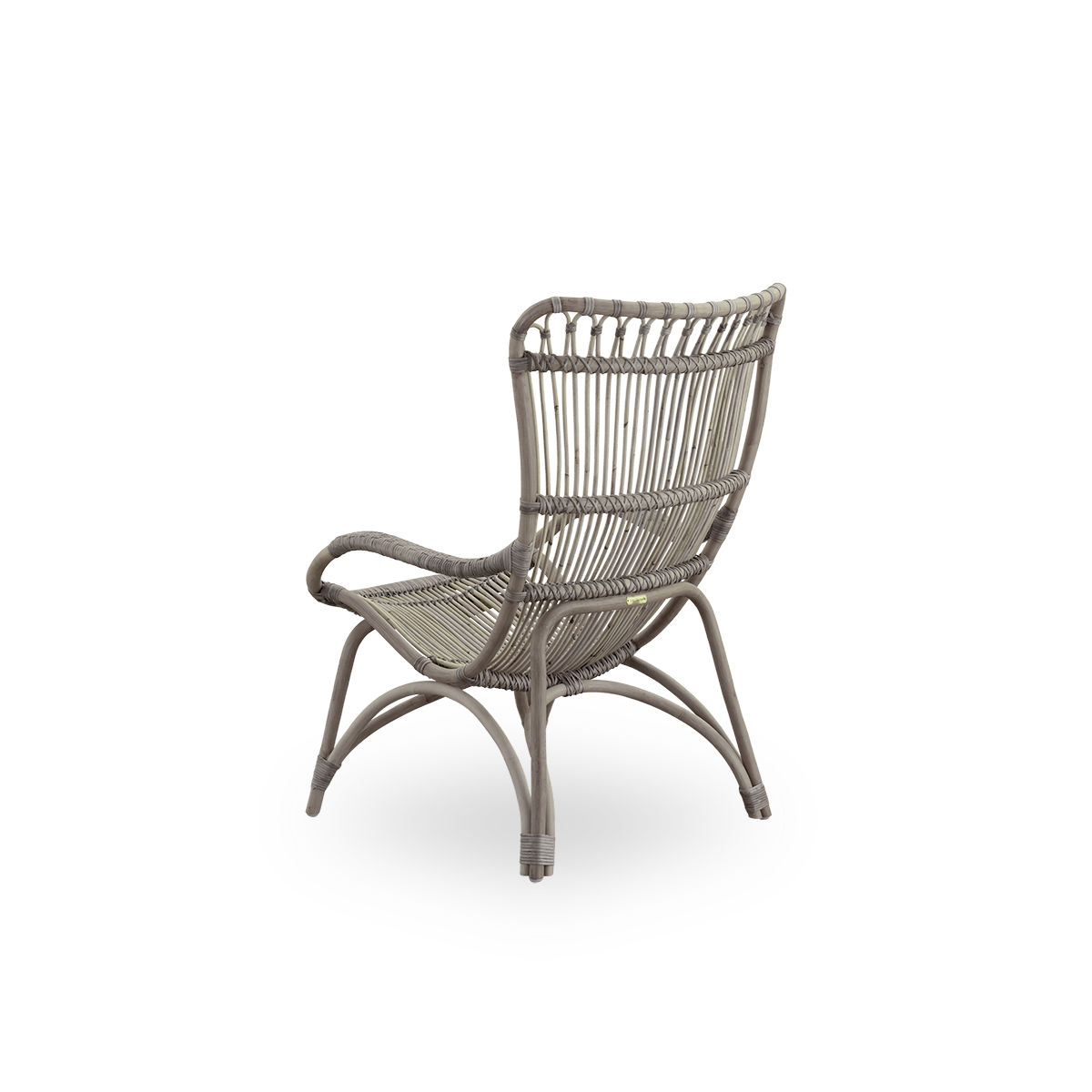 Plain back view of Monet lounge chair with high backrest and armrests presented in Taupe color. Handcrafted from high-quality Indonesian rattan.