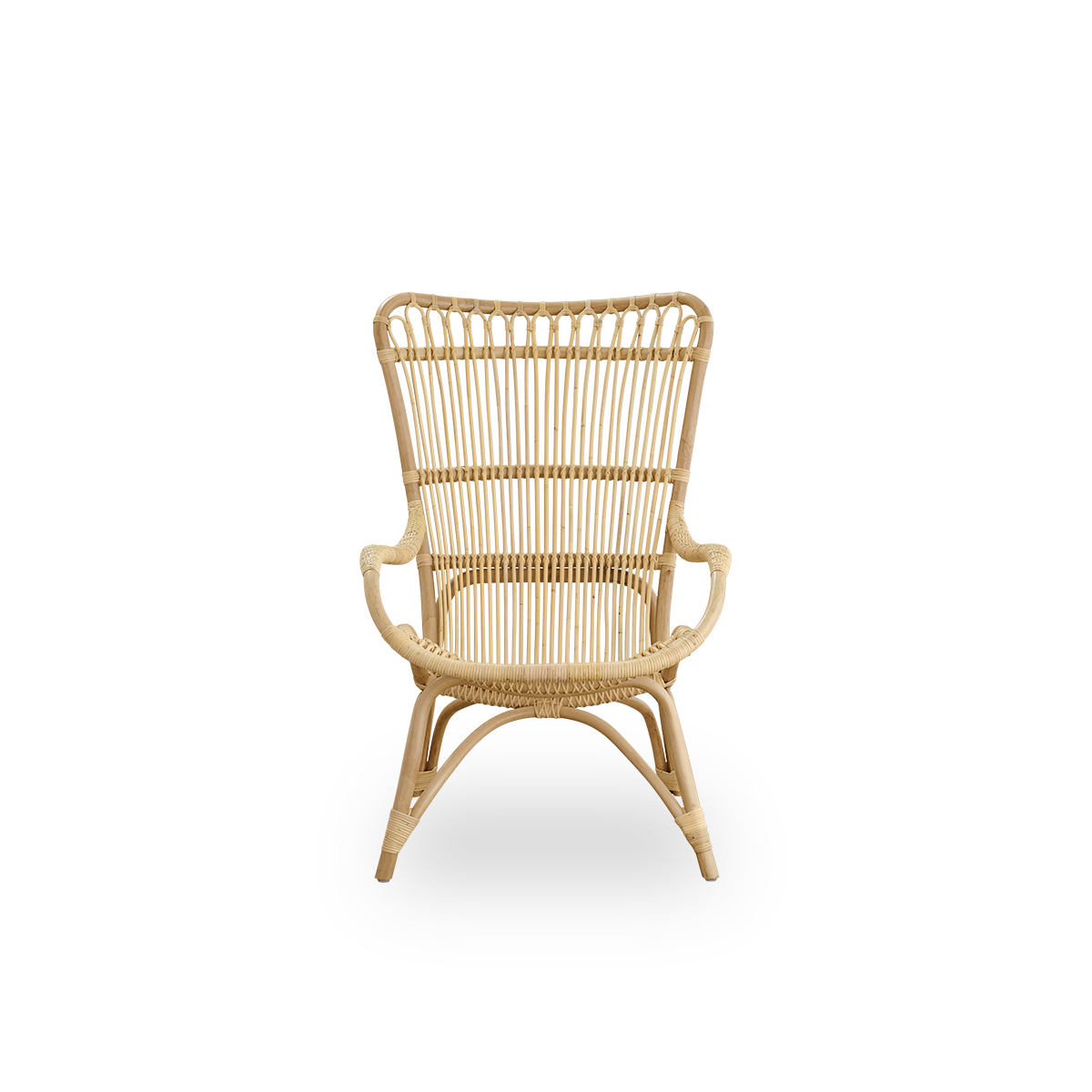 Front view of the Monet lounge chair with high backrest and armrests presented in natural rattan.
Handcrafted from high-quality Indonesian rattan.