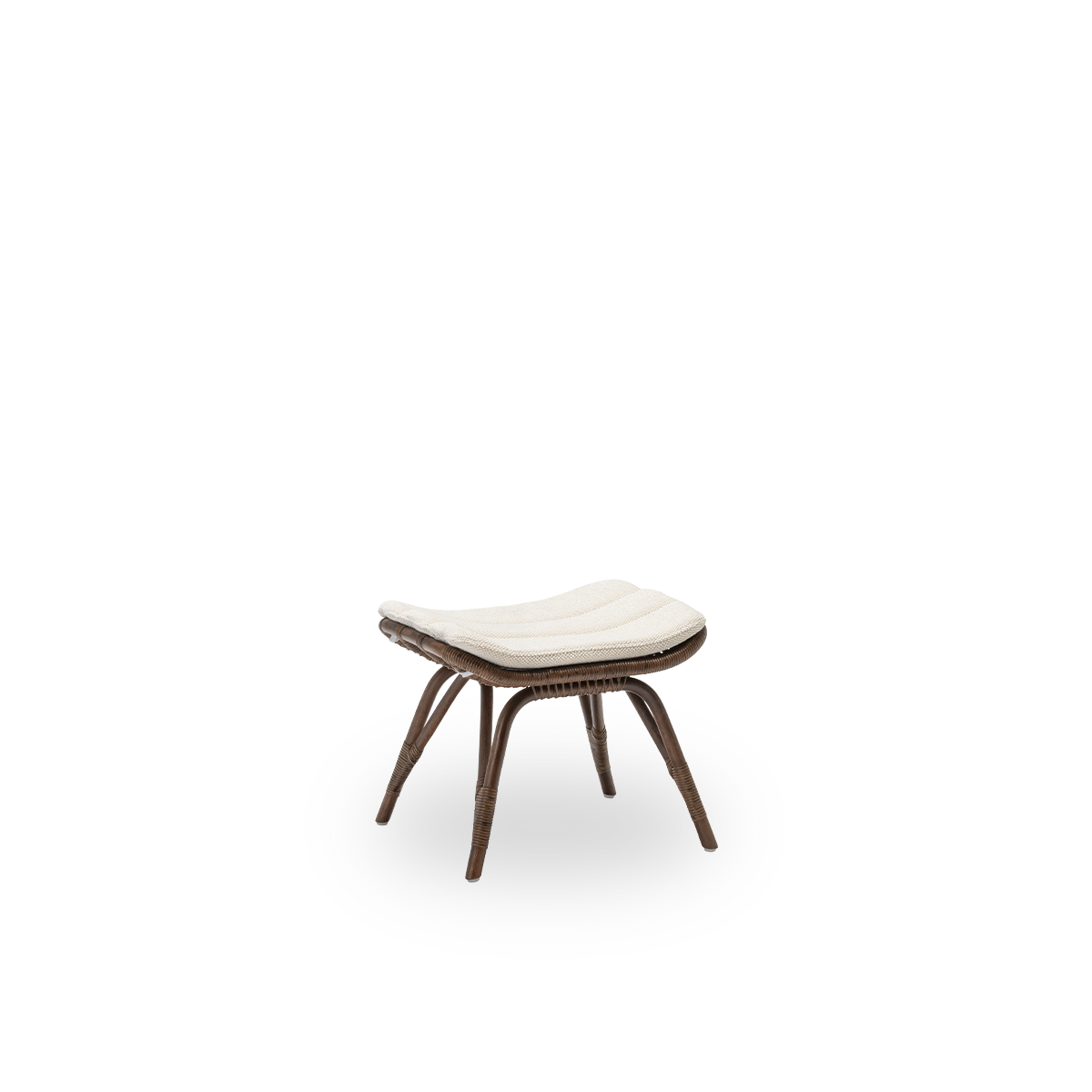 Side view of the Monet footstool with seat cushion, in brown rattan. An elegant Danish design made to match the Monet lounge chair. Handcrafted from high-quality Indonesian rattan.