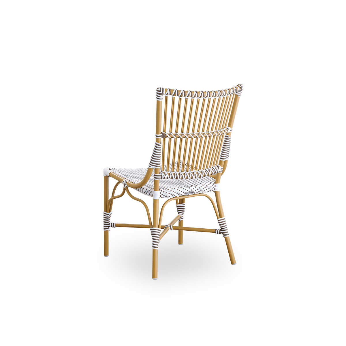 Back side view of the Monique outdoor dining chair.
Aluminum frame in almond color with seat woven with ArtFibre in white with brown dots. Inspired by 1950s bistro design.