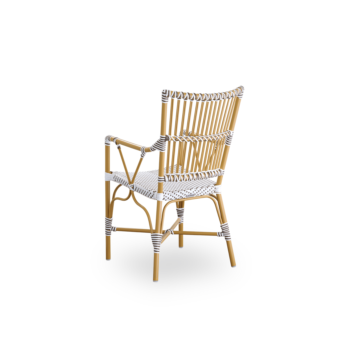 Back side view of the Monique outdoor dining armchair.
Aluminum frame in almond color with seat woven with ArtFibre in white with brown dots. Inspired by 1950s bistro design.