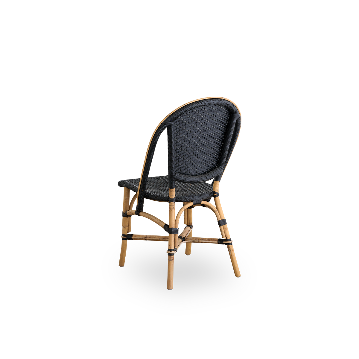 Back side view of the Sofie rattan dining chair inspired by French café style.
Rattan frame with fully woven seat and backrest handcrafted in ArtFibre in black color. Stackable rattan bistro chair.