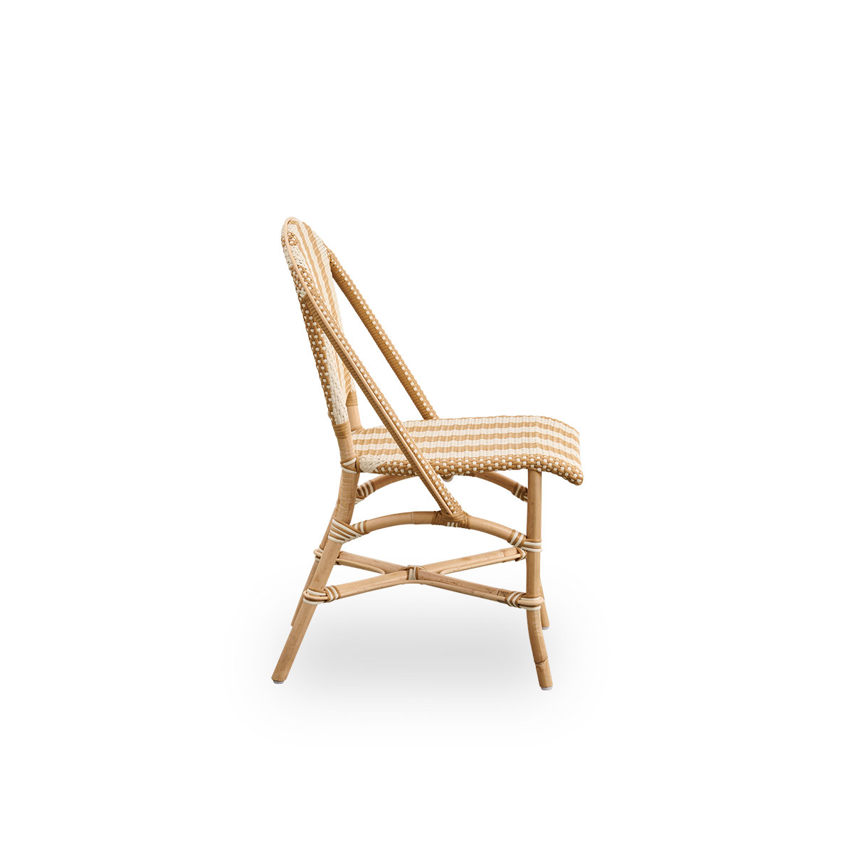 Plain side view of Sofie rattan dining chair inspired by French café style. Rattan frame with fully woven seat- and backrest handcrafted in ArtFibre in broad striped pattern in Ivory and Honey. Stackable rattan bistro chair.