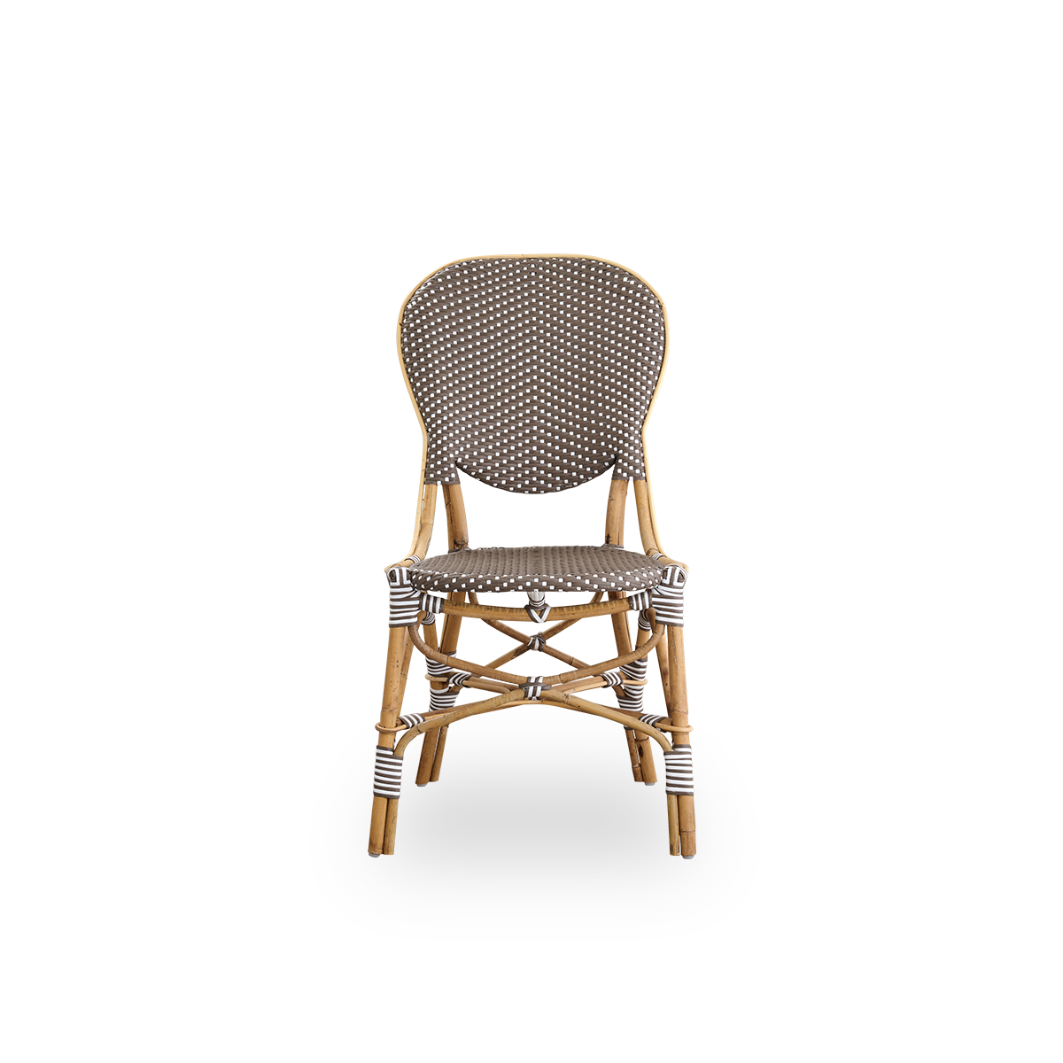 Front view of the Isabell dining chair.
Rattan frame with seat and backrest made in brown ArtFibre with white dots. Inspired by 1950s bistro design.