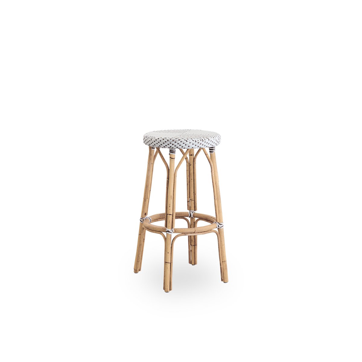 Side view of Simone barstool height 78 cm. Rattan frame with footrest, with fully woven round seat handcrafted in ArtFibre in white with brown dots pattern. Stackable barstool.