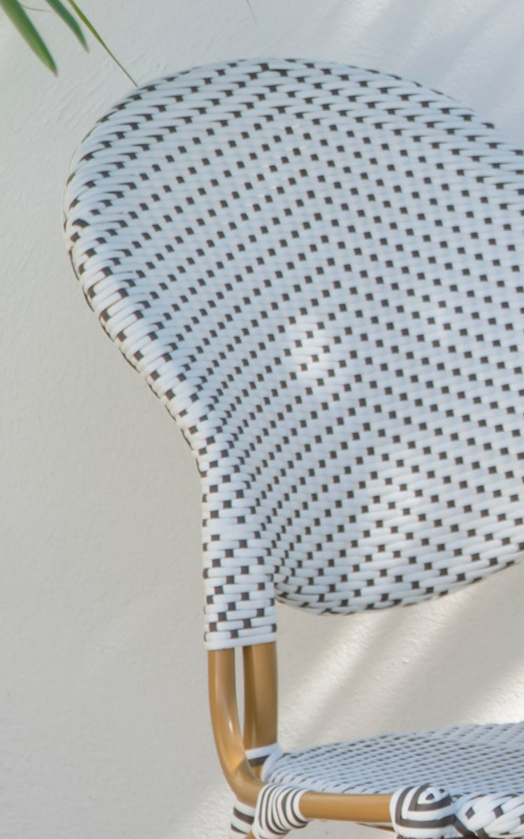 This is a close-up image of Isabell in almond aluminium frame White w cappuccino dot ArtFibre.