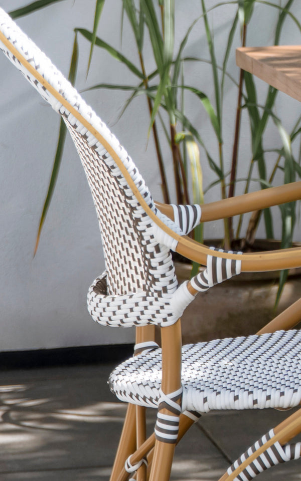 This is a close-up image of Isabell in almond aluminium frame White w cappuccino dot ArtFibre.