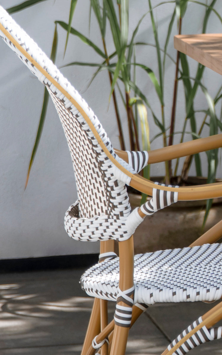 This is a close-up image of Isabell in almond aluminium frame White w cappuccino dot ArtFibre.