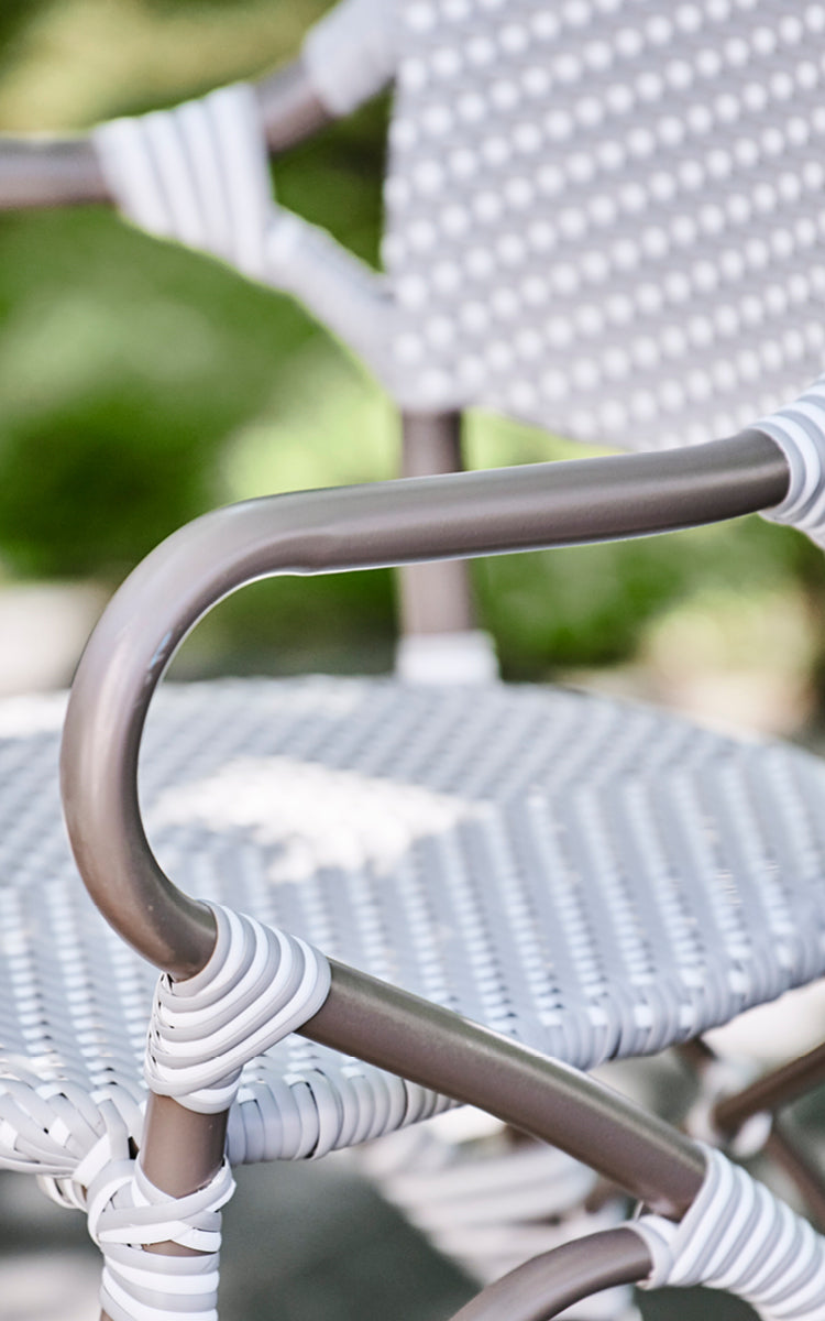 This is a close-up image of Isabell in taupe aluminium frame Grey w white dot ArtFibre.