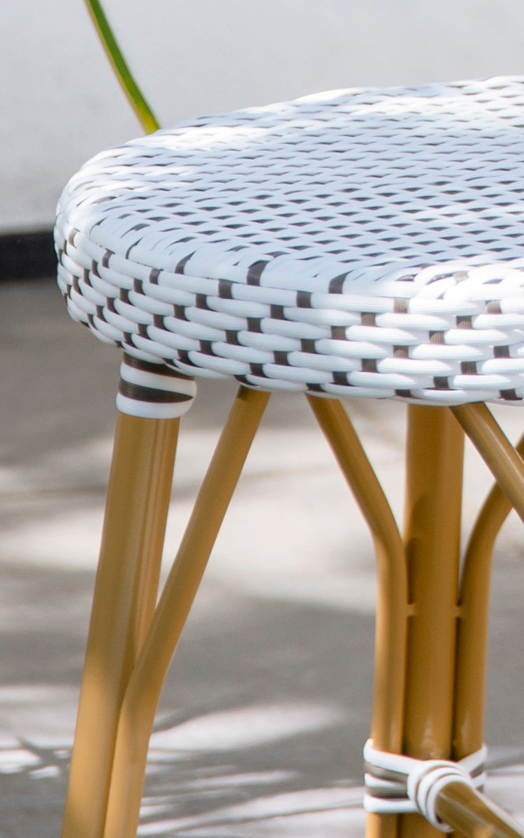This is a close-up image of Simone Exterior Stool in almond aluminium frame white w cappuccino dot artfibre.