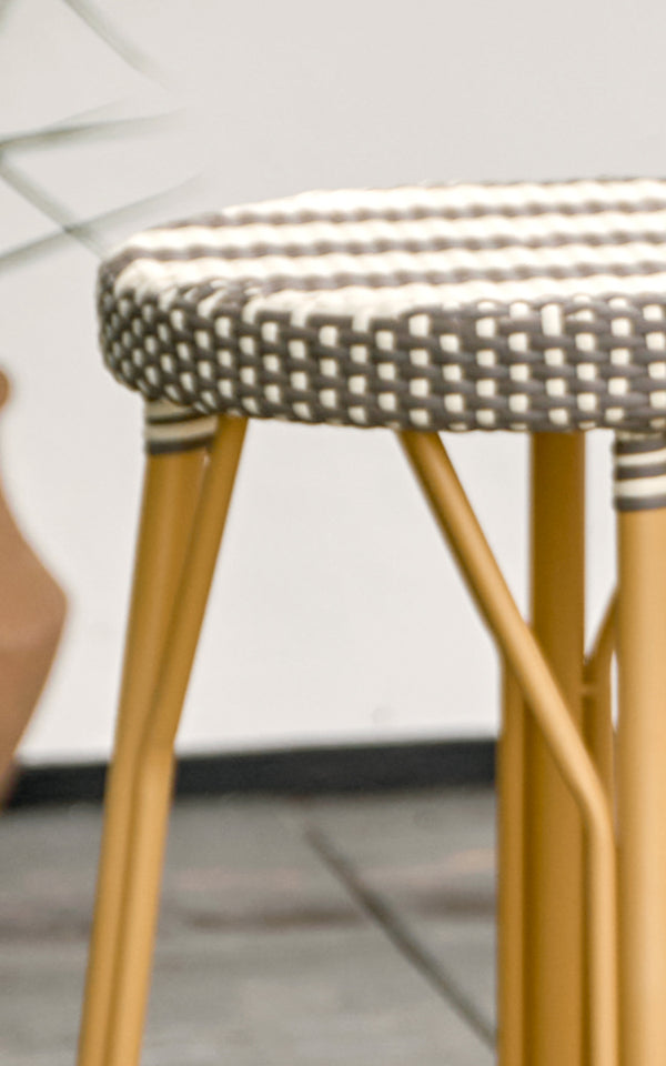 This is a close-up image of Simone Exterior Counter Stool in almond aluminium frame striped cappuccino ivory artfibre.