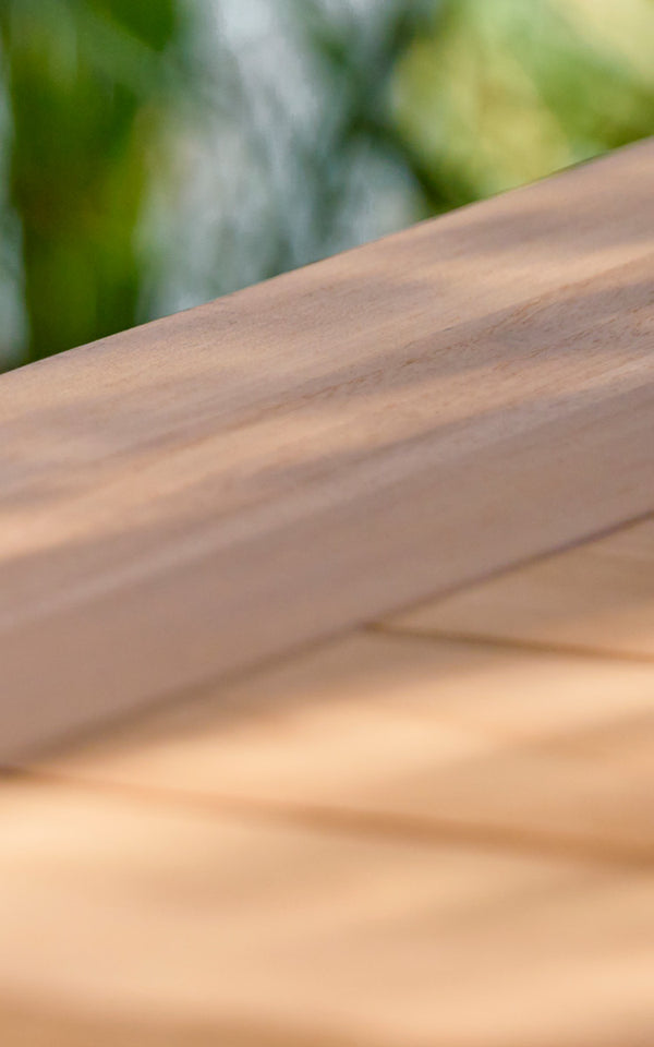 This is a close-up image of Colonial Table 200 in outdoor Teak.