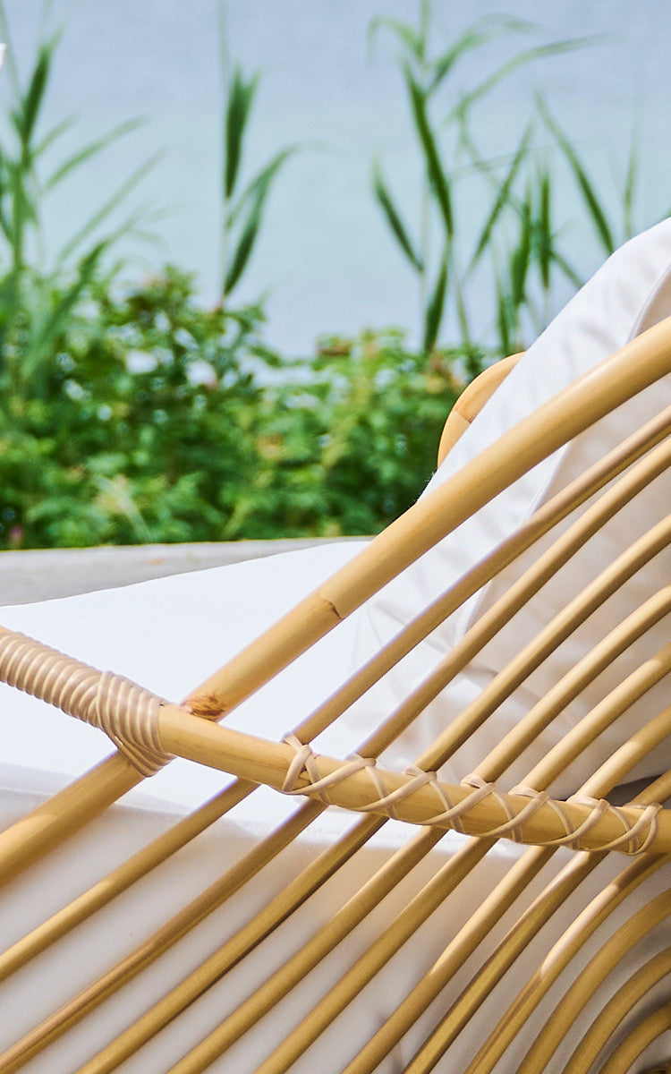This is a close-up image of Charlottenborg Exterior 2 Seater Sofa in natural Aluminium ArtFibre.