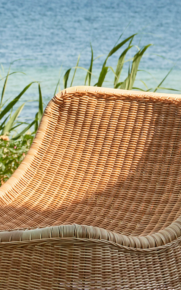 This is a close-up image of Chill Lounge Chair in natural core weave ArtFibre Aluminium.