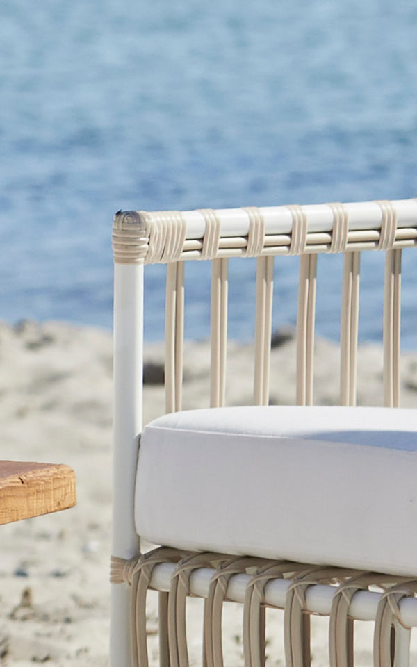 This is a close-up image of Caroline Exterior Lounge Chair in dove White Aluminium ArtFibre.