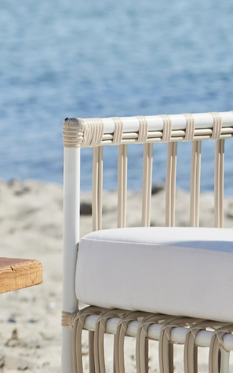This is a close-up image of Caroline Exterior Lounge Chair in dove White Aluminium ArtFibre.