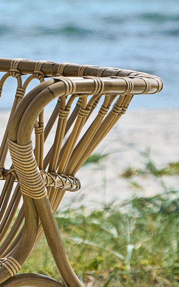 This is a close-up image of Fox Exterior Lounge Chair in antique Aluminium ArtFibre.