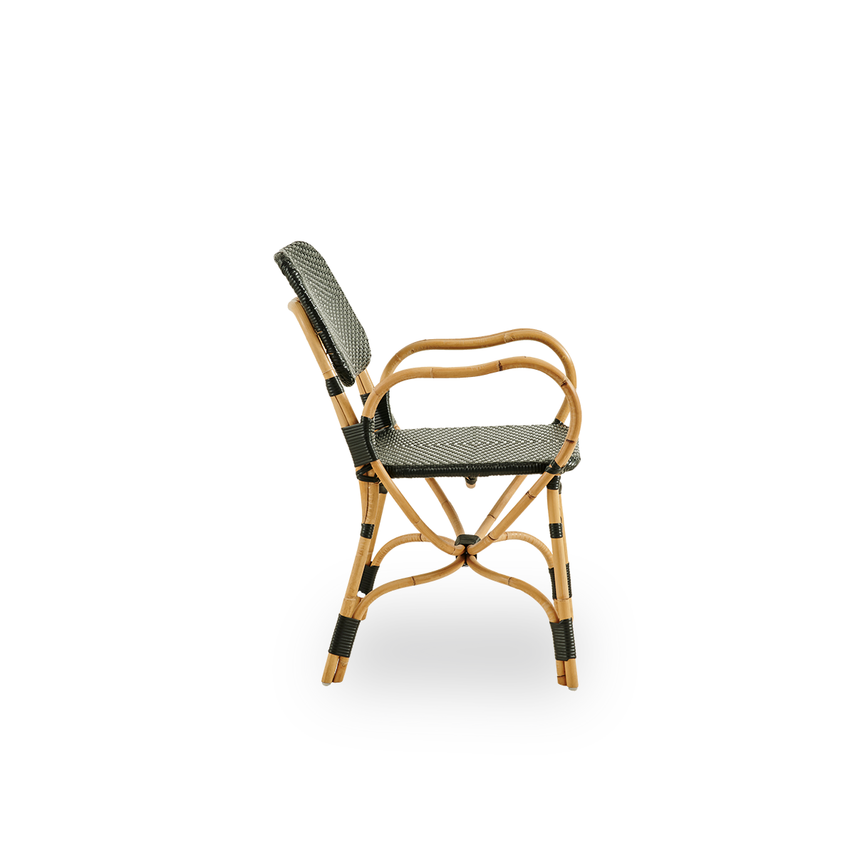 Plain side view of Bistro chair in black ArtFibre weave with elegant design. Rattan frame with seat woven in ArtFibre. The curved Rattan frame under the seat extend into armrests.