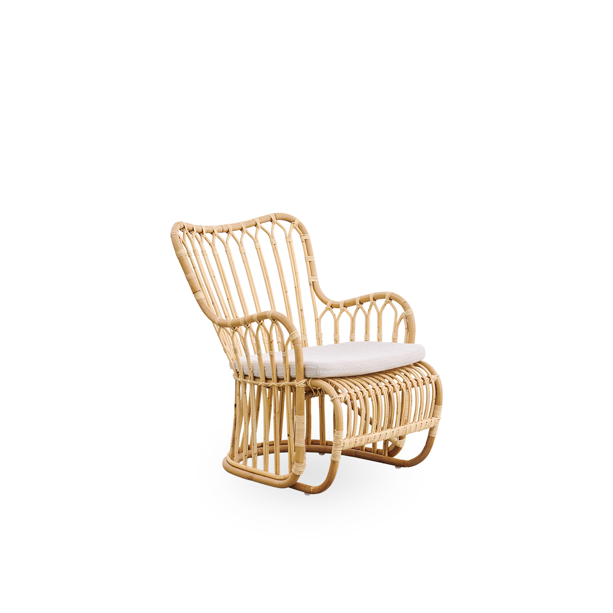 Side view of Tulip lounge chair designed by Tove Kindt-Larsen, with soft organic lines. Handcrafted from high-quality Indonesian rattan