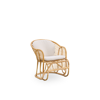 Side view of Swing lounge chair designed by Tove Kindt-Larsen. Handcrafted from high-quality Indonesian rattan and fitted with seat and back cushion.