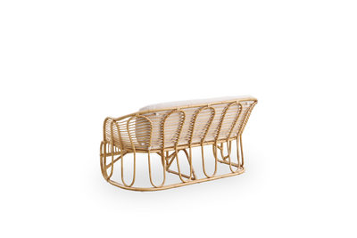 Back side view of the Swing 2-seater sofa designed by Tove Kindt-Larsen.
Handcrafted from high-quality Indonesian rattan and fitted with seat and back cushion.
