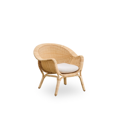 Side view of Madame Exterior lounge chair designed by Nanna & Jørgen Ditzel. Fully woven rattan lounge chair with soft, feminine shell-shaped design.