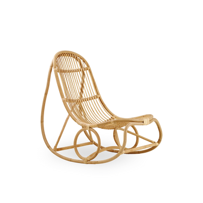 Side view of Nanny rocking chair designed by Nanna Ditzel presented in high quality natural rattan.