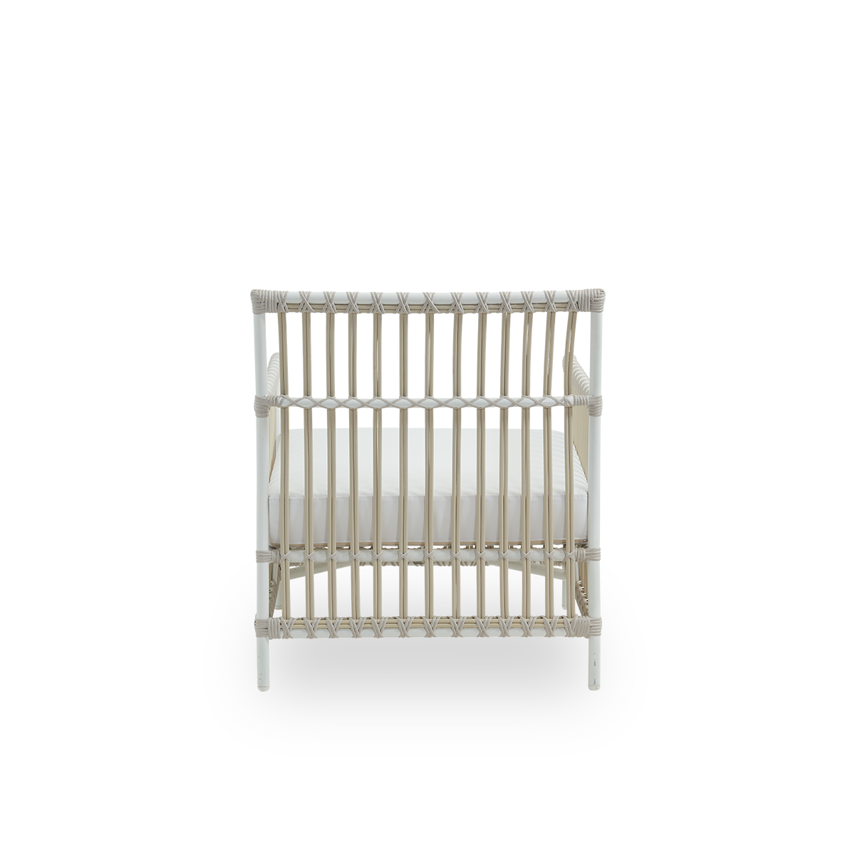 Plain back view of Caroline Exterior Lounge Chair in the color dove white, presented in simple and elegant Danish design. The frame of the chair is made from aluminum with elegant ArtFibre details. The chair has a cozy, calming presence.