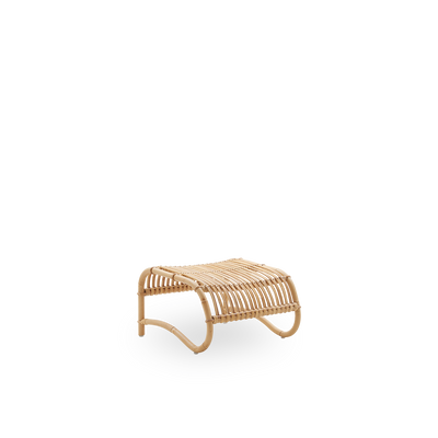 Side view of Teddy rattan footstool designed by Viggo Boesen. Handcrafted in high quality rattan.