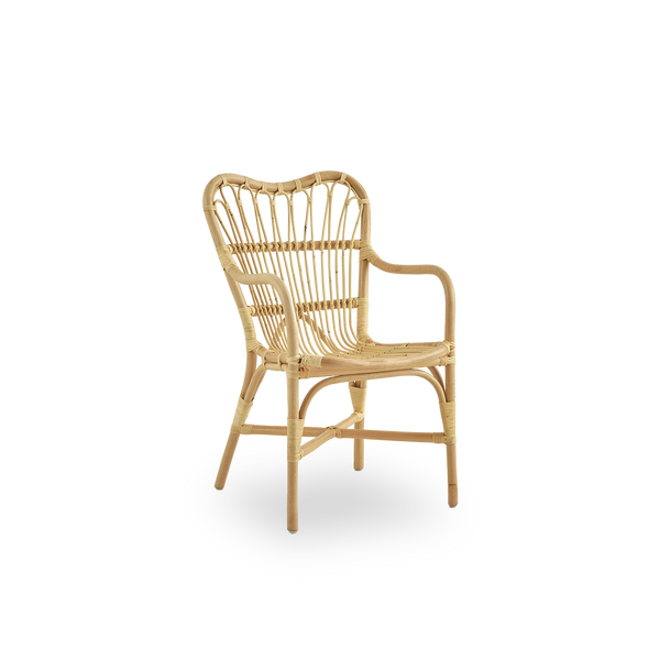 This is a close-up image of Margret Dining Chair in natural rattan.