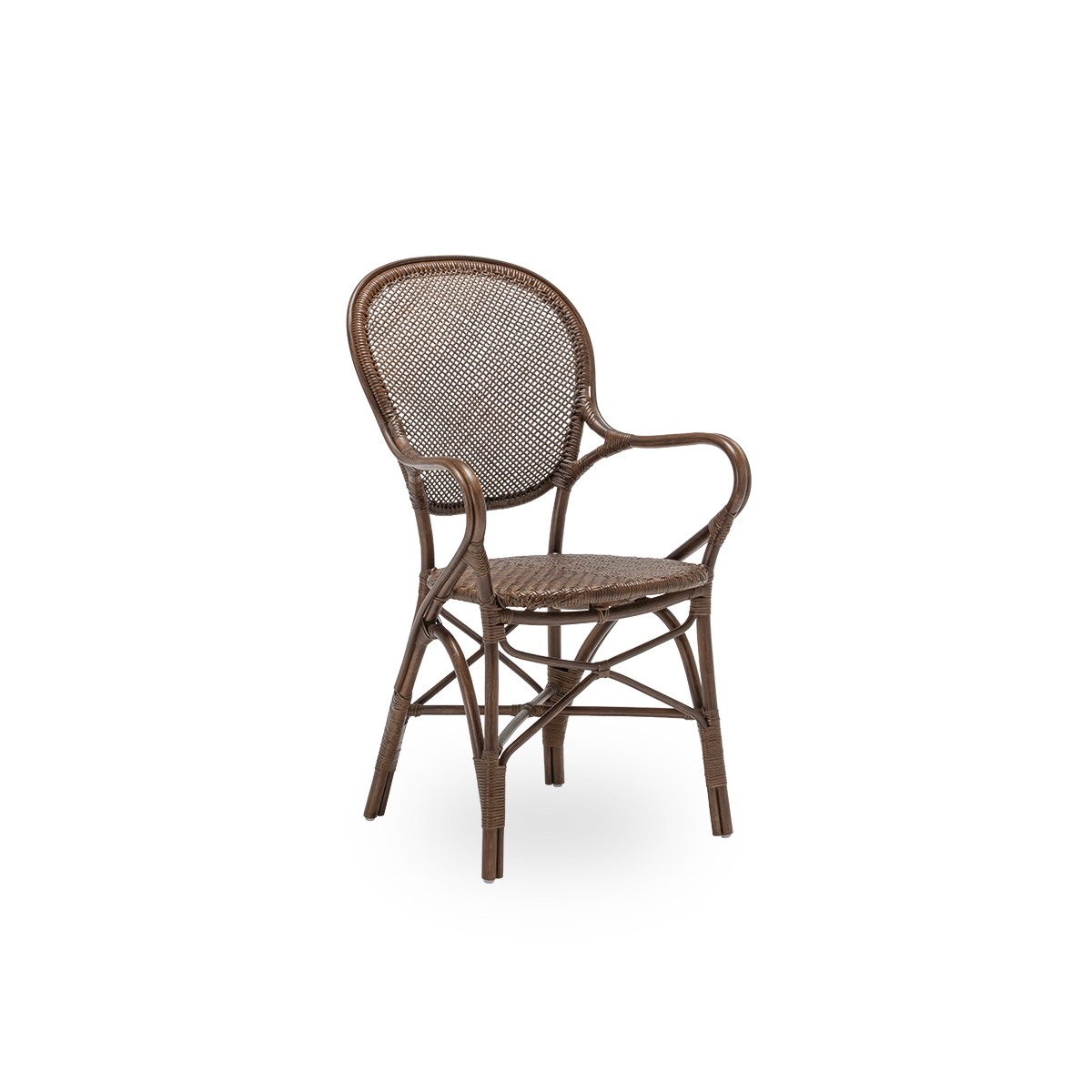 Side view of the Rossini dining armchair, in brown rattan. Designed in 1993 by Knud Andreasen of Sika-Design together with Japanese designer Yamakawa, it is the brand's signature chair. Handcrafted from high-quality Indonesian rattan.