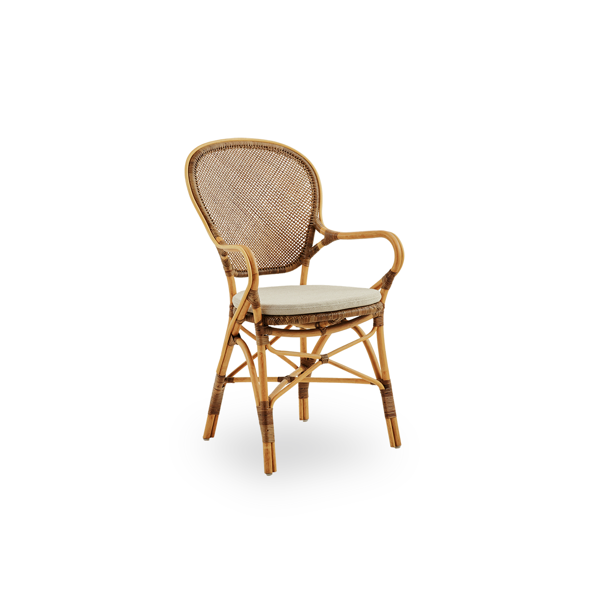 Side view of Rossini dining armchair in Cherry color. Elegant wicker chair with round backrest and armrests in simple design. Handcrafted from high quality rattan.