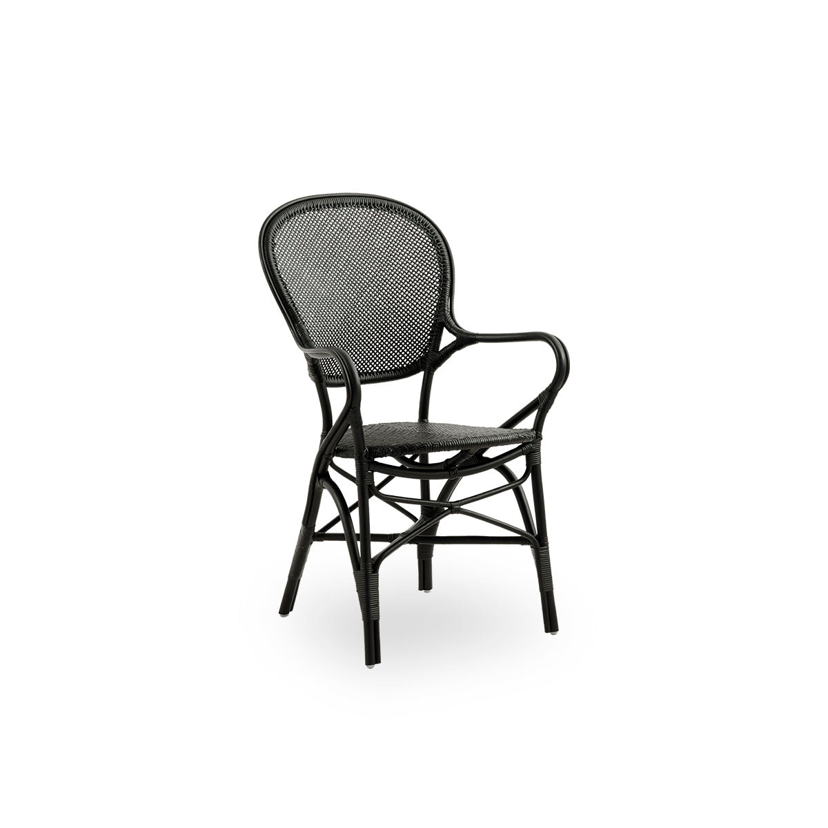Side view of Rossini dining armchair in black color. Elegant wicker chair with round backrest and armrests in simple design. Handcrafted from high quality rattan.