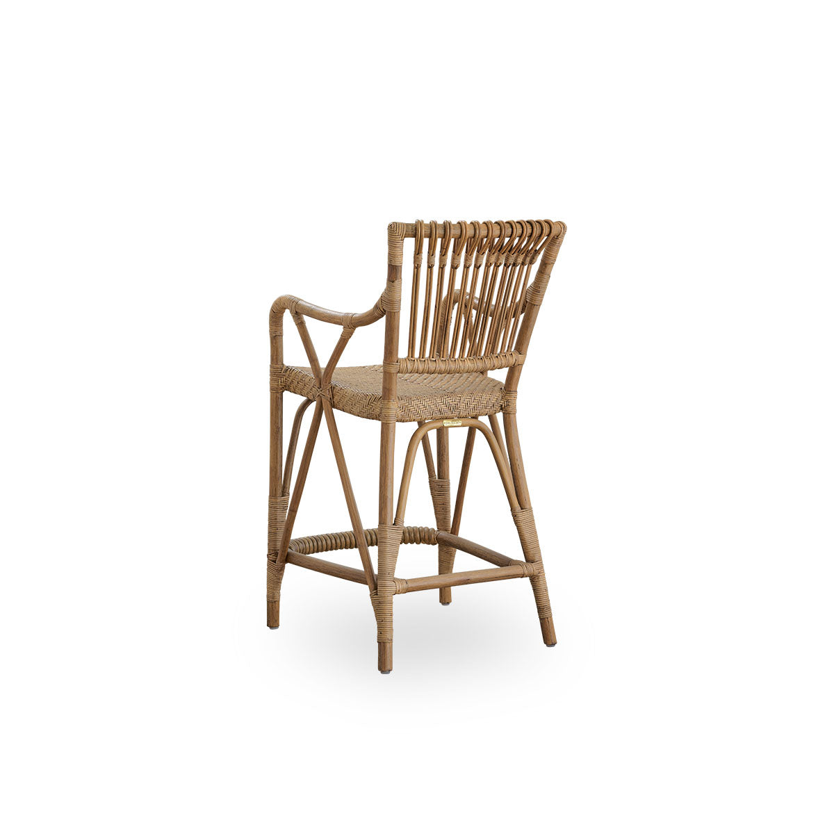 Back side view of Blues counter stool in antique brown color made of Indonesian rattan. Handwoven seat on a rattan frame with rattan backrest.