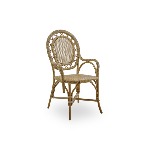 Side view of Romantica dining chair in Antique brown color. Elegant, romantic wicker dining chair with round backrest and fully woven seat in charming Danish design. Handcrafted from high-quality Indonesian rattan.