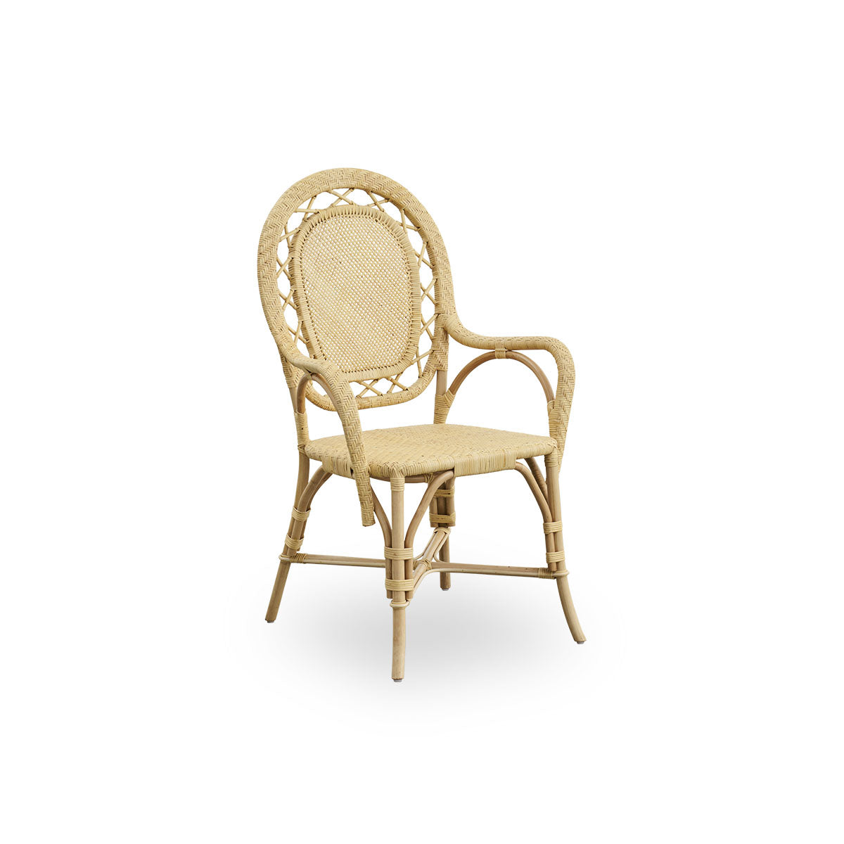 Side view of Romantica dining chair in Natural color. Elegant, romantic wicker dining chair with round backrest and fully woven seat in charming Danish design. Handcrafted from high-quality Indonesian rattan.