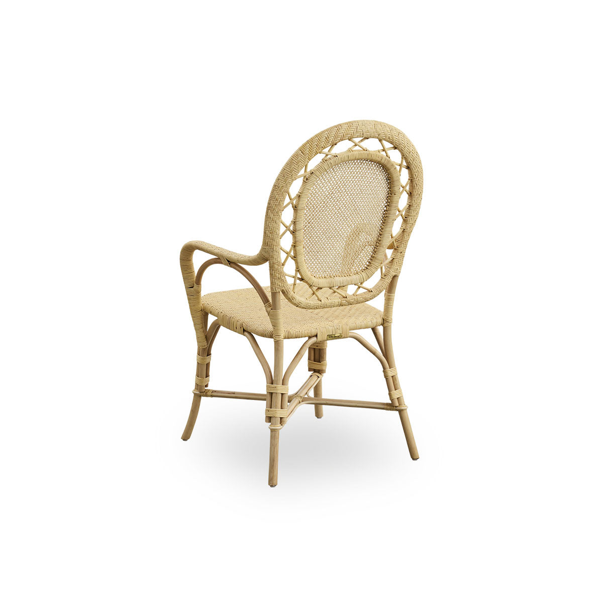 Back side view of the Romantica dining chair in natural color.
Elegant, romantic wicker dining chair with round backrest and fully woven seat in charming Danish design. Handcrafted from high-quality Indonesian rattan.