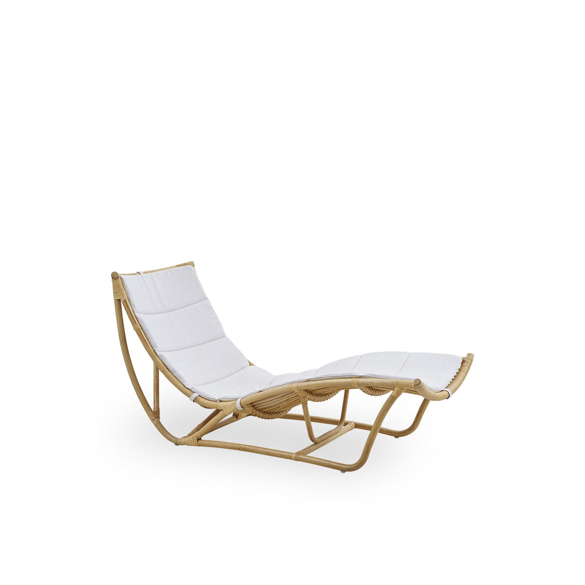 Side view of Michelangelo daybed in Natural rattan color. Handcrafted from high-quality Indonesian rattan.
