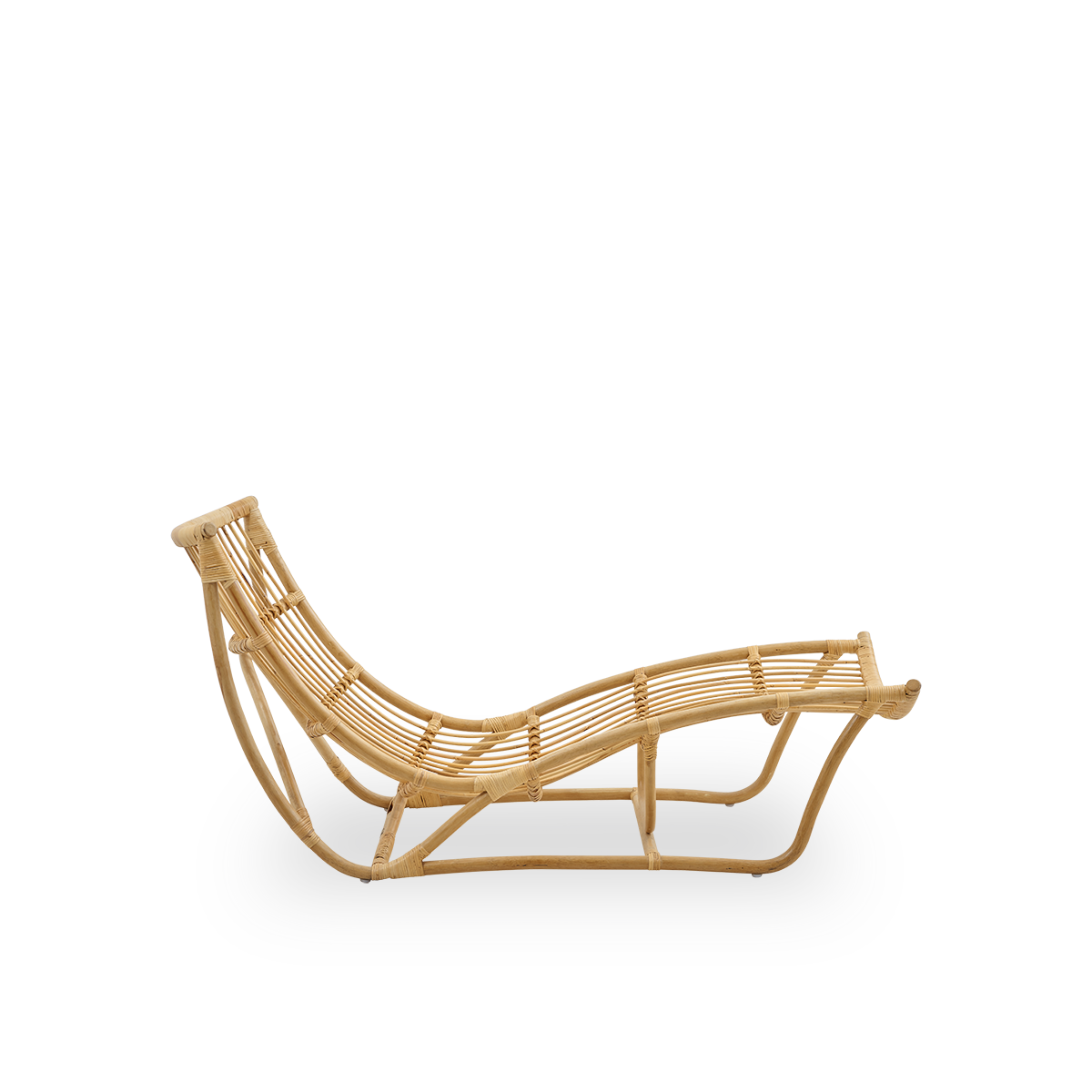 Plain side view of Michelangelo daybed in Natural rattan color. Handcrafted from high-quality Indonesian rattan.