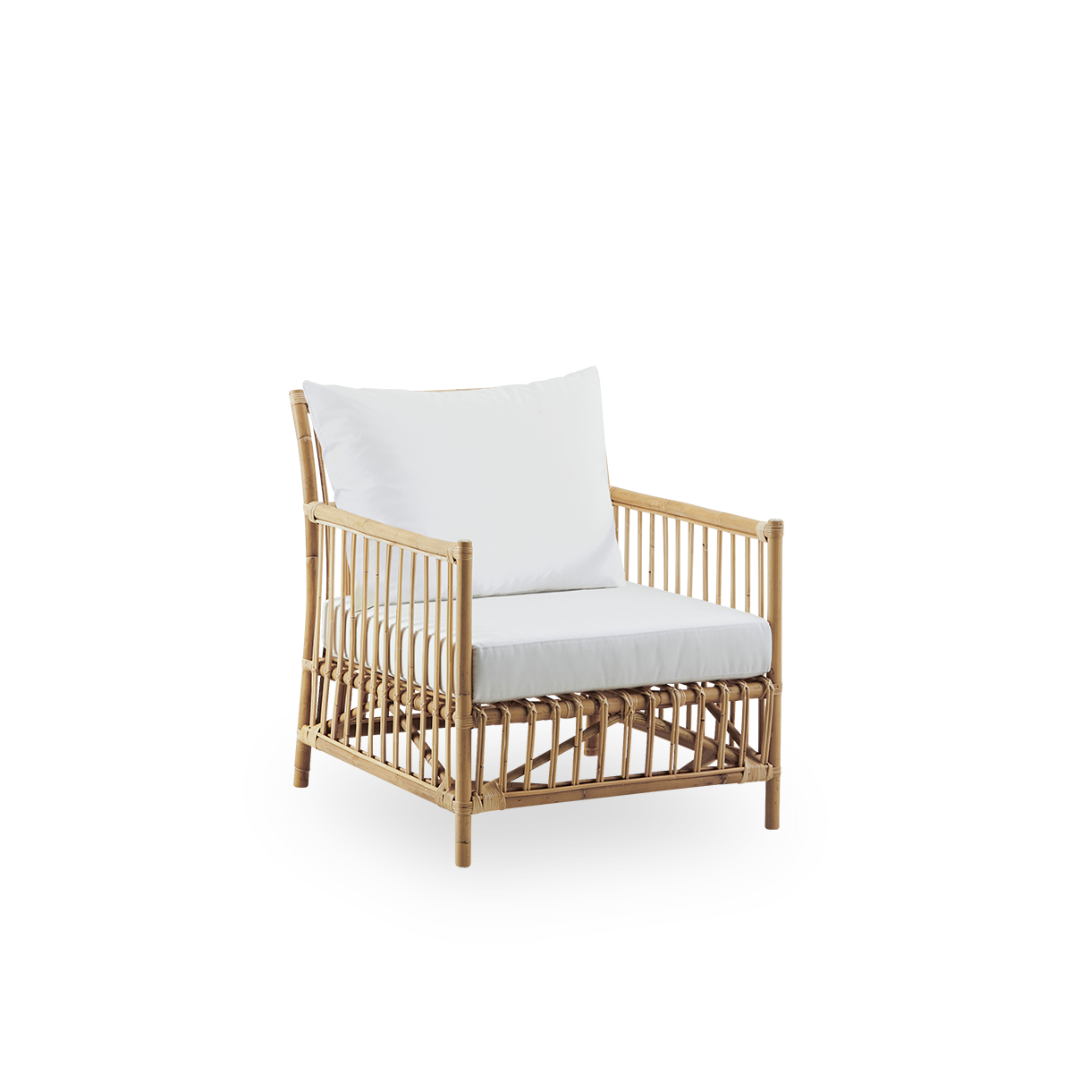 Side view of Caroline Lounge Chair, simple and elegant Danish design. Handcrafted from Indonesian rattan. The chair has a cozy, calming presence.