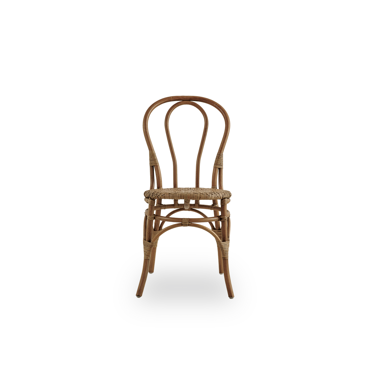 Front view of the Lulu dining chair in antique brown color, handcrafted from high-quality Indonesian rattan.
Lightweight, elegant design with a round and simple backrest.