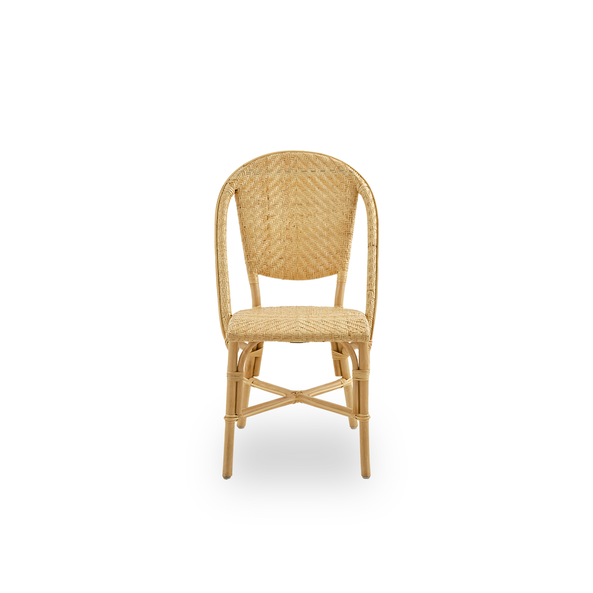 Front view of Alanis dining chair in high-quality natural rattan, featuring elegant curves and detailed weaving.